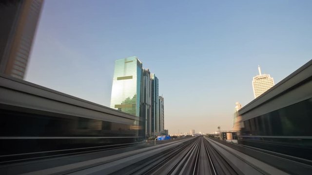 sun light dubai city famous metro line road trip panorama 4k time lapse uae
