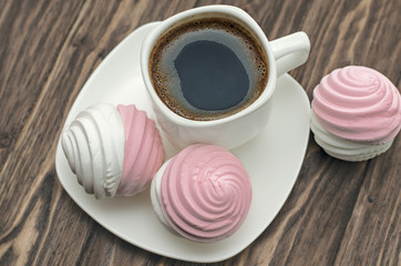 Sweet pink marshmallow - zephyr and cup of coffee