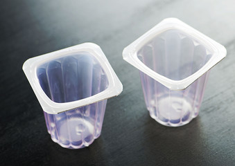 Plastic containers for desserts.
