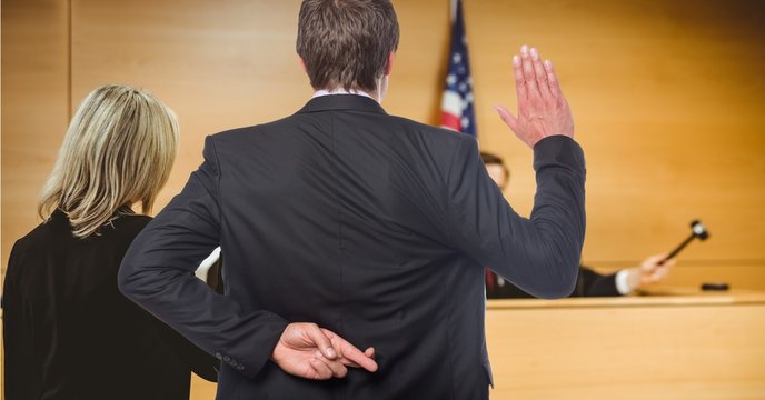 Men Swearing In The Judge With Fingers Crossed