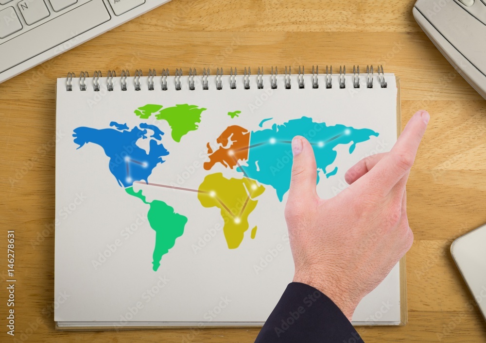 Poster hand over colorful map on a notepad