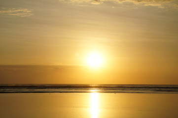 Fototapeta premium Golden sunset in the Gili Islands of the coast of Bali