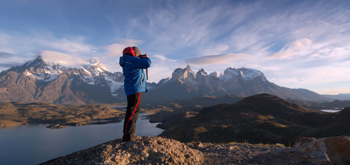 Photographer in a national park Torres del Paine, Patagonia, Chile - obrazy, fototapety, plakaty
