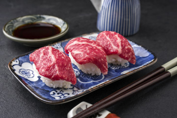 Traditional Japanese Wagyu Nigiri Sushi as close-up on a plate