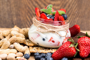 Dessert with strawberries on a wooden table