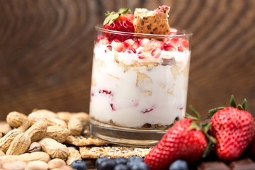 Dessert with strawberries on a wooden table