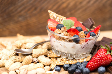 Dessert with strawberries on a wooden table