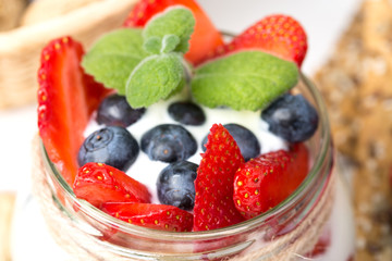 Dessert with strawberry mint and chocolate mousse. Shallow depth of field.