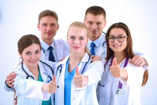 Portrait of doctors team showing thumbs up