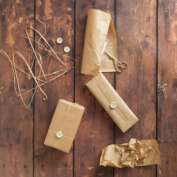 Brown paper packages wrapped up in string