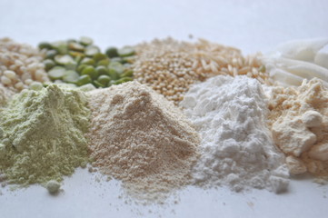 Fototapeta na wymiar Alternative gluten-free flour, grains, seeds and legumes - teff, amaranth, corn, chickpeas, sorghum, green peas, quinoa, rice, coconut