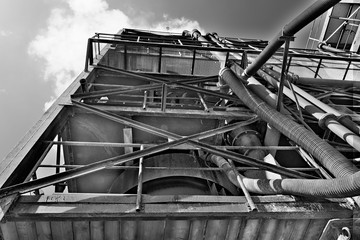 Industrial metall tower. Sand quarry aggregate.  Black & white photo.