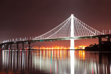 Fototapeta na wymiar Midnight at the Bay Bridge in San Francisco, CA.