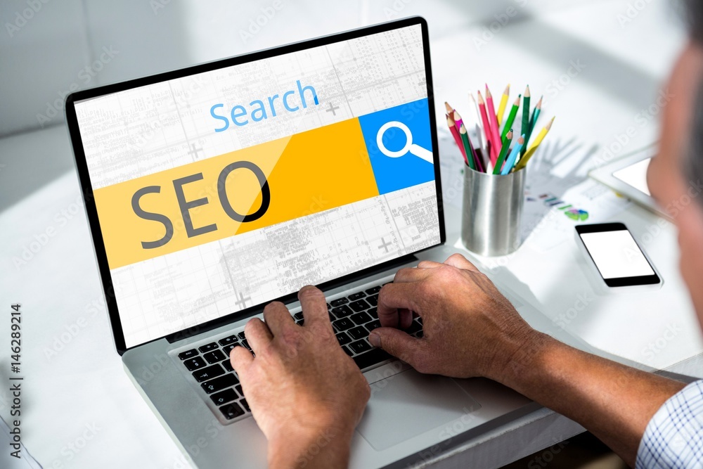Poster man working on laptop with seo word search field