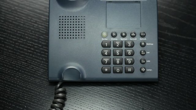 Shots Of Office Phones Being Used To Make Business Calls 