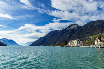 Mountains at lake Lucern and Village Brunnen. View from boot, Switzerland