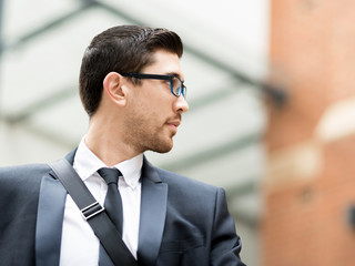 Fototapeta premium Portrait of handsome businessman outdoor