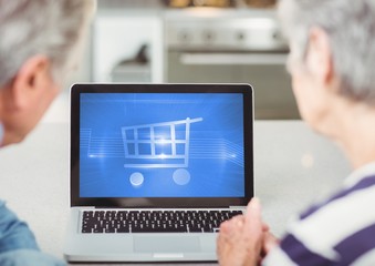 Old Couple using Tablet with Shopping trolley icon