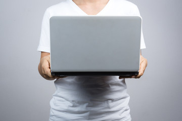 Woman holding laptop