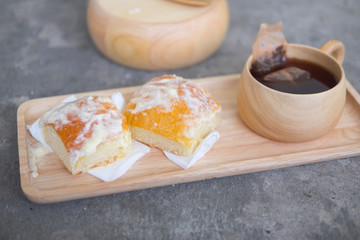 Fresh bread sprinkle with cream butter and sugar