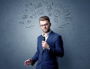 Businessman holding microphone