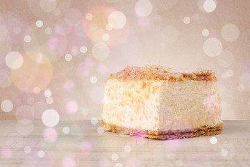 Delicious tasty homemade cakes with bokeh light background