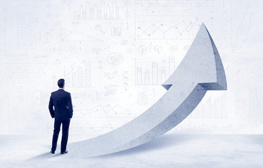 Obraz premium Financial businessman with arrow concept