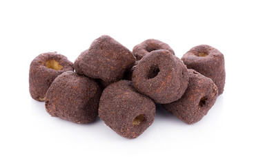 Crunchy corn chocolate snacks on a white background