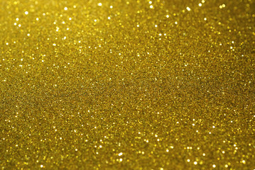 Light gold glitter bokeh texture background