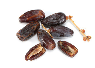 Group of delicious dates laying, dried date palm, The raisin isolated on white background.