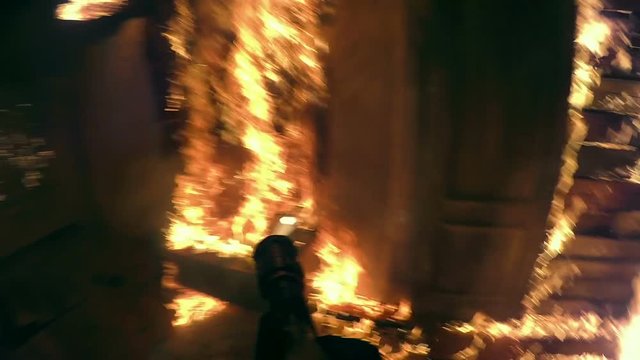 A fireman in a burning house