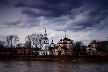 orthodox church river bank sky clouds