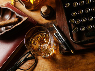 Writer's night with a glass of whiskey