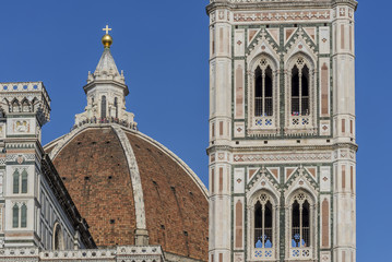 Beautiful detail of Giotto's Campanile and Cathedral Santa Maria del Fiore, Duomo of Florence, Italy, on a sunny day