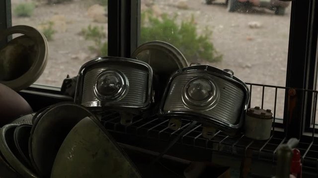 Eldorado Canyon mine tours, Old-timer car in an rustic garage with spare parts, 4K - 5