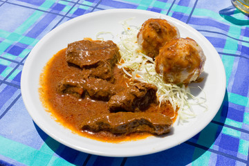 Veal stew with dumplings
