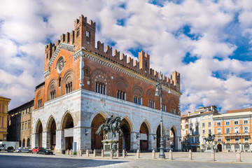 Piacenza, Italy. Piazza Cavalli (Square horses) and palazzo Gotico (Gothic palace) in the city center. Main square of Piacenza - obrazy, fototapety, plakaty