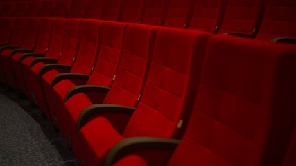 Red Chairs in Hall in a Row