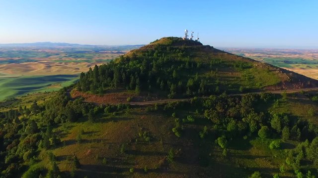 Aerial shooting through the hillside of Palouse Steptoe Butte, USA.