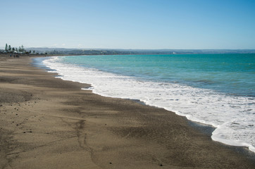 Fototapeta na wymiar Black Sand Beach in Napier, Hawkes Bay region, North Island, New Zealand