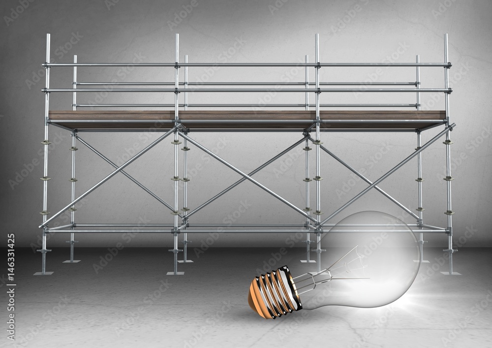 Poster lightbulb in front of scaffolding in grey room