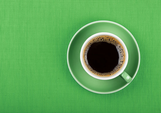 Full Black Coffee In Green Cup Close Up Top View