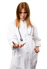 Fototapeta premium Tired young doctor woman