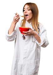 Young doctor woman eating cereals from a bowl