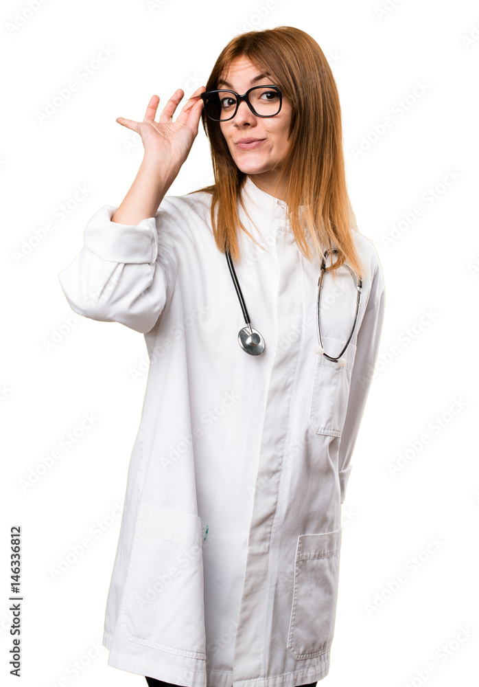 Wall mural Young doctor woman with glasses