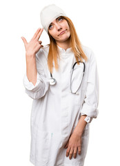 Young doctor woman with headache