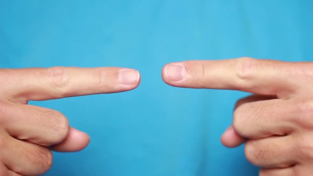 Man trying to connect finger with finger