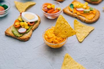 Healthy Homemade souse with chipsand  Avocado Toast with guacamole