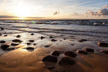 View of a rocky coast beach in the morning.