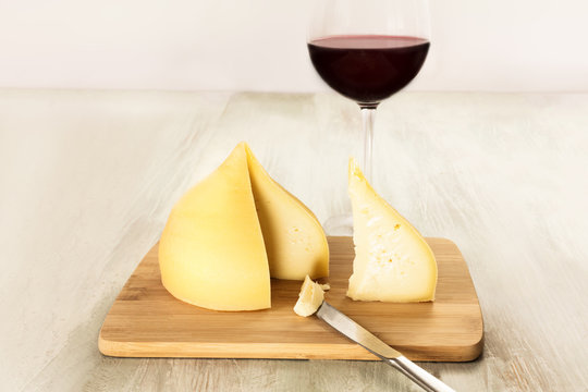 Tetilla, traditional Spanish cheese, with a glass of wine